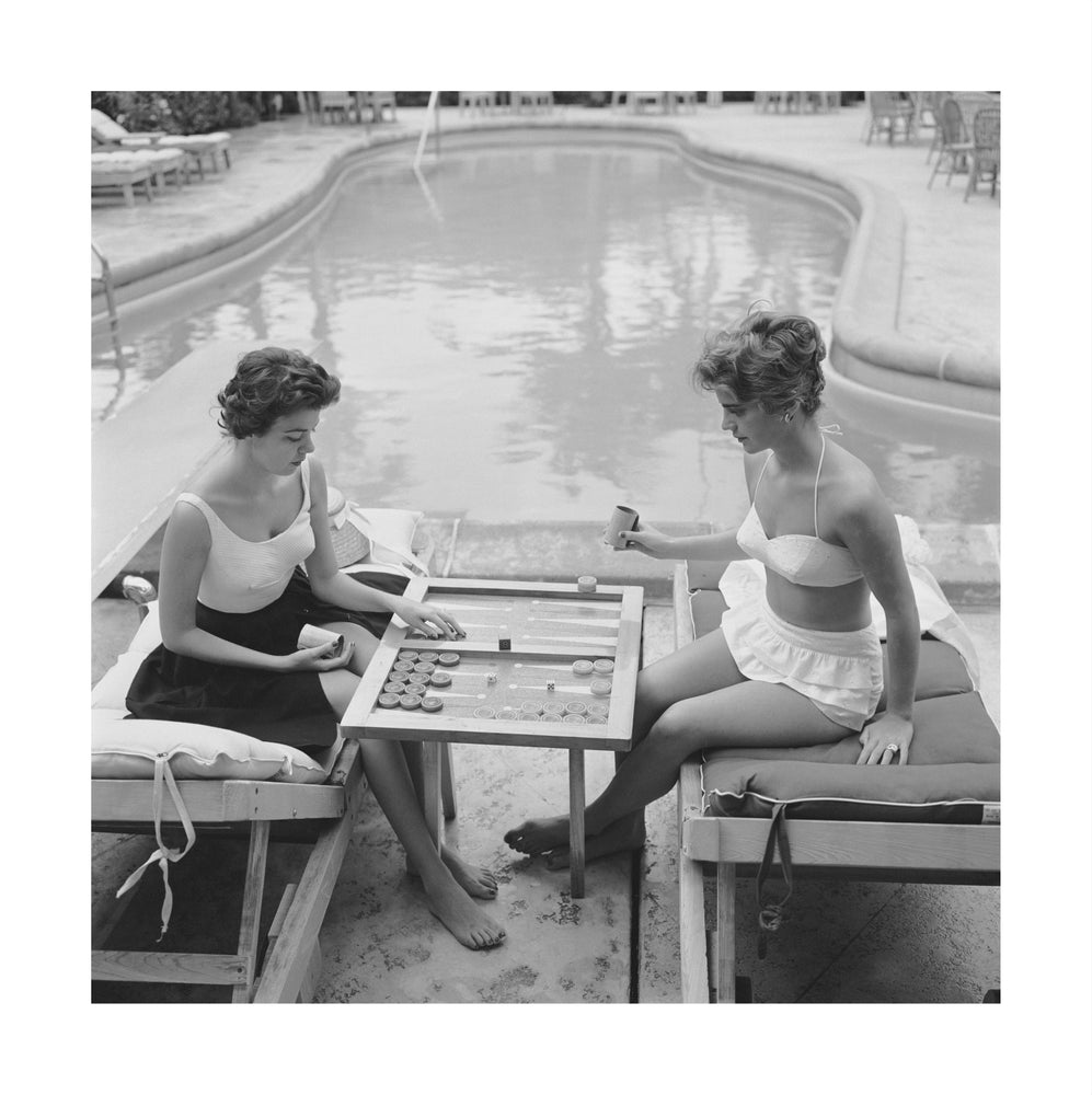 Backgammon By The Pool photographic art print by Slim Aarons | Enter Gallery